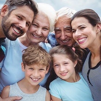 Three generations of smiling family