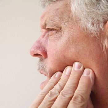 man with jaw pain