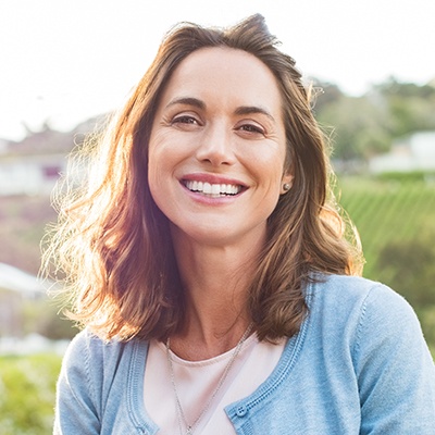 Woman with healthy smile outdoors