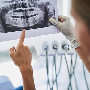 Dentist and patient discussing advanced dental implant procedures in Phillipsburg