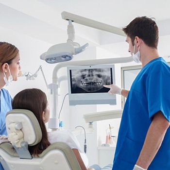 Phillipsburg implant dentist discussing replacing missing teeth