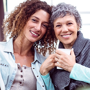 Two women smiling together