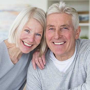 Older woman and man smiling together